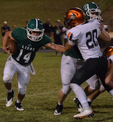 Franklin County quarterback Everett Haselden runs the ball during a game against Habersham Central Sept. 27 in Carnesville.