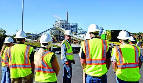 GRP Franklin Plant Manager David Groves (center) leads a group of county officials on a tour of the plant Monday. (Photos by Scoggins)