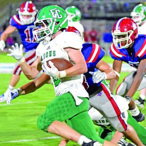 Sophomore Chris Goode turns upfield to gain part of his 84 yards against Jefferson Friday night. (Photo by Scoggins)