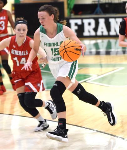 Lady Lion Emily Carson drives into the lane during action Friday in the Bearden Border Wars tournament at FCHS.