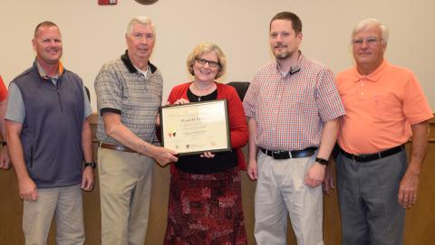 Elaine Evans (center) stands with Franklin County Commissioners (from left) Eddie Wester, Thomas Bridges, Jason Macomson and Robert Franklin after receiving her state clerk's certification in 2017. Commissioners voted 3-2 Tuesday not to reappoint Evans as clerk. Not pictured is Commissioner Ryan Swails, who was not a member of the board at the time this photo was taken.