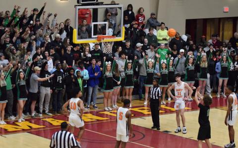 Titus Brown shoots a free throw during Franklin County's 70-65 win over Hart County Friday in the Region 8AAA Tournament semifinals.