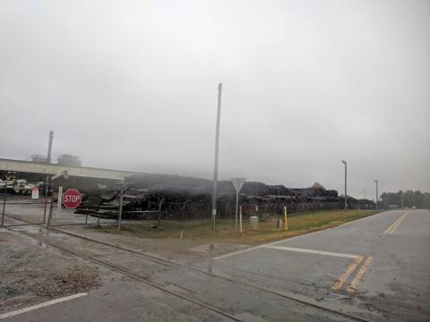 A bill that would ban the burning of creosote railroad ties like these stacked outside the Georgia Renewable Power plant in Madison County got a hearing Tuesday in the Georgia State Senate.