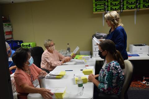 Franklin County Elections workers began processing hundreds of absentee ballots for Tuesday's primary elections last week.