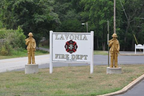 The assistant chief of the Lavonia Fire Department has been charged with four counts of theft by taking.