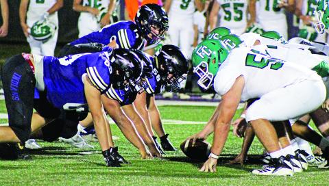 The Franklin County High School Lions football team (shown lining up this past Friday against Lumpkin County in Dahlonega) will play its first game of the season in Ed Bryant Stadium Friday against Banks County. Local officials have set forth guidelines to protect students from exposure to the coronavirus. (Photo courtesy of Jake Cantrell of The Dahlonega Nugget)