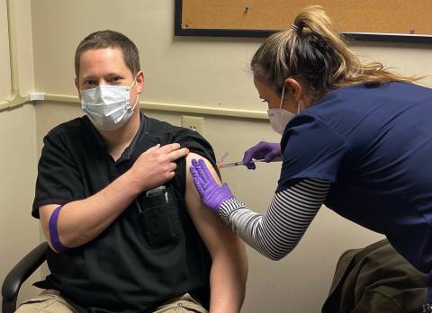 Jason Macomson gets vaccinated for the COVID-19 virus by a nurse at VitaLink Research in Anderson, S.C. Macomson and five other Franklin County residents took part in trials for the new Moderna coronavirus vaccine.