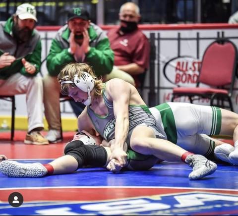 Franklin County Lion Charlie Henkel pins his opponent to win the Class AAA 170-pound championship last week at the state tournament in Macon. (Photo courtesy of Amber Cloy Photography)
