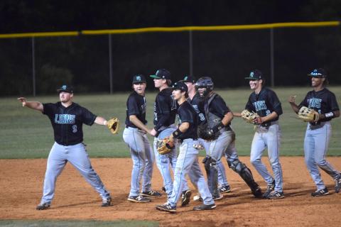 The Franklin County Lions celebrate after defeating Sonoraville Wednesday to advance to the state playoff quarterfinals.