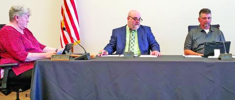 In Superintendent Chris Forrer’s absence, Chuck Colquitt is filling his role as acting superintendent, including filling his seat between Robin Cato and Alan Mitchell at Franklin County Board of Education meetings. (Photo by Sinclair)