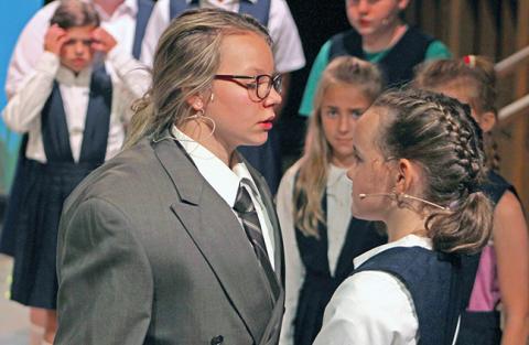 Matilda (Brooke Tate, right) stands up to Agatha Trunchbull (Alice Tanner, left) in a scene from Franklin Community Players’ Youth Summer Theatre camp’s production of “Matilda Jr.,” which opens this weekend. (Photo courtesy of Amy Burns)