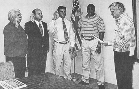 In this photo, first published in the Jan. 6, 2000, issue of The News Leader, David Jordan (second from left) and Keith Turman (second from right) are sworn in as new members of the Royston City Council by then-Mayor Steve Williams (right), along with Paul Crawford (left) and Greg Gurley (center). Turman was the only person to qualify to run for mayor of Royston in November. Current Mayor Jordan decided not to run.