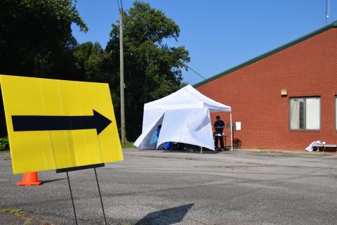 A sign points the way to the COVID-19 drive-through testing location that opened up at the Franklin County Health Department Wednesday. It is one of two drive-through testing locations in District 2. Those wishing to be tested are encouraged to visit www.phdistrict2.org to register. (Photo by Sinclair)