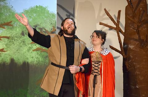 King Arthur (Josh Bryan) shares the magic of Camelot with Guenevere (Jamee Floyd) in the title number. (Photo by Sinclair)