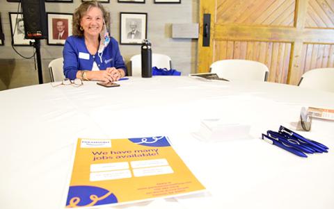 Emily Hayes patiently waits for job seekers at the Lavonia Job Fair last week. (Photo by Sinclair)