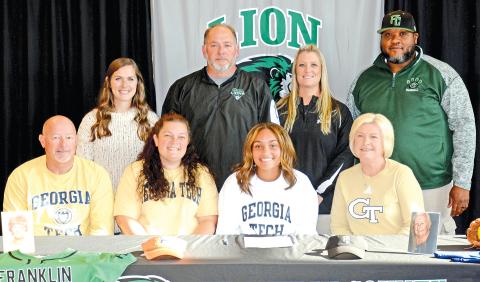 Jayden Gailey signed last week to play softball for Georgia Tech. Pictured at her signing ceremony are (front, from left) grandfather Randall Gailey, mom Haden Gailey Stephens, Jayden, grandmother Lane Gailey, (back) Franklin County High School softball coaching staff Mackenzie Burns, Head Coach Jason Oliver, Cherokee Bell and Demond Rivers. (Photos by Scoggins)