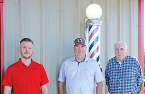 Mens World Barber Shop in Royston is celebrating 50 years in business. Founder Gayle Fields (above right) has retired but son Matt (above center) carries on the business with fellow barber Jame Lewis (above left).