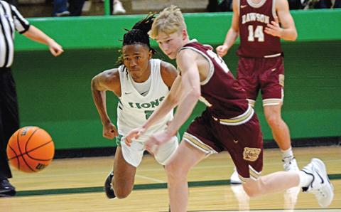 Lion Makael Merritt (left) sprints after a loose ball in action Friday against Dawson County in Carnesville. (Photo by Scoggins)