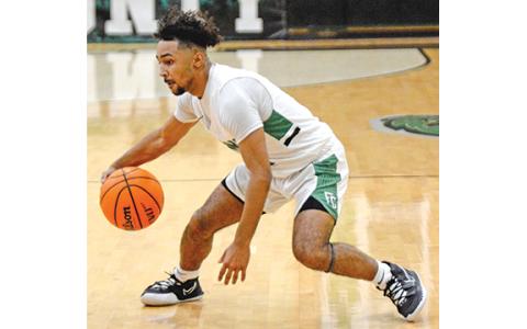 Senior Keez Roebuck looks for an opening to drive Friday in a contest against Rabun County.
