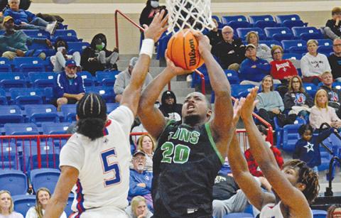 Jontavion “Jo Jo” Hughes shoots in an early-season game with Jefferson. The senior led Franklin County with 21 points Tuesday against Seneca, S.C.