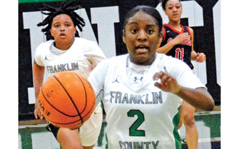 Lady Lion Paris Gaye breaks away for a basket in a win last week over Gainesville.