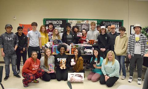 Students in Mandy Ginn’s advanced algebra classes raised $1,400 to purchase gifts for three local families and supplies for families in Kentucky. (Photo by Sinclair)