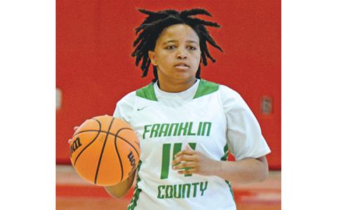 Ny’Kerriah Brown brings the ball up the floor in a game against Winder-Barrow in Jefferson earlier this season. Brown led Franklin County in points in the Lady Lions’ first two wins of the season against Lanier and Seneca, S.C.