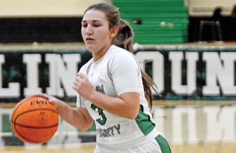 Kayleigh Chappell brings the ball upcourt during action Friday against Dawson County in the Lion’s Den. (Photo by Scoggins)
