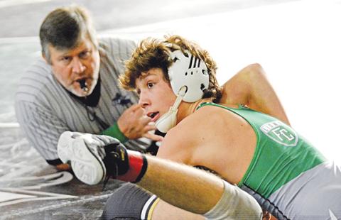 Kenly Eavenson controls an opponent during the Lions Thanksgiving Tournament last week at the wrestling gym on Busha Road in Carnesville. Franklin County will host two home matches in Carnesville next week, their final home matches of the season. (Photo by Scoggins)