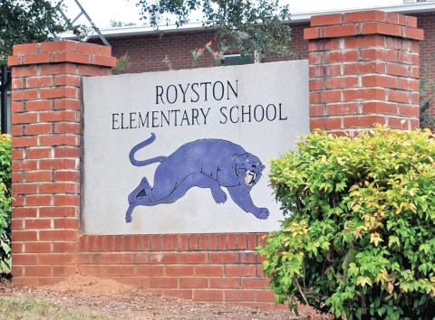 The board adopted a resolution Tuesday for a $21.7 million bond to build a new elementary school to replace the aging Royston Elementary School.