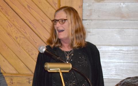 Diane Holmes reacts in shock as she reaches the podium after being announced as Citizen of the Year at the Lavonia Chamber of Commerce Banquet Thursday at the Depot downtown. (Photo by Sinclair)