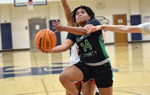 Ny'Kerriah Brown goes up for a layup in the region consolation game victory over Hart County. (Photo by Scoggins)