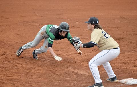 Landon Bruce dives back to first base to avoid being picked off during a game between the Franklin County Lions and Pendleton, S.C., Friday in Carnesville. (Photo by Scoggins)