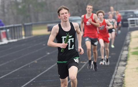 Robbie Woods placed second in 3,200 meters. (Photo by Scoggins)