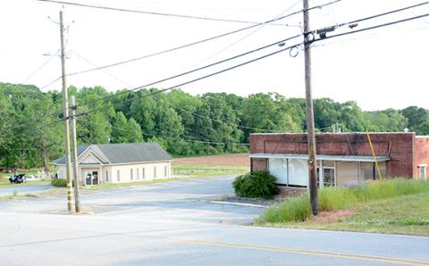 A request to build a liquor store in the former DFCS building (far right) on Hull Avenue in Carnesville was turned down after a hearing in which citizens questioned its proximity to the Carnesville park and splash pad (far left). (Photo by Scoggins)