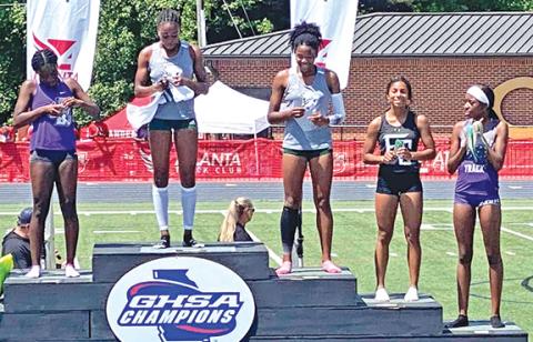 Franklin County Lady Lion hurdler Lexi Knox (far right) finished on the podium twice at the State Track Championships. Knox was fifth in the 100 meter hurdles and eight in the 300 meter hurdles. (Photo courtesy of Franklin County Track)