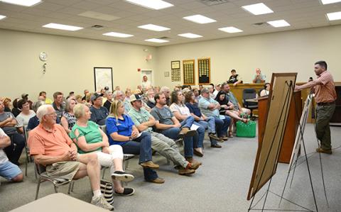 Planning and Zoning Director Scott DeLozier presents information about the UDC to a large crowd at a recent meeting.