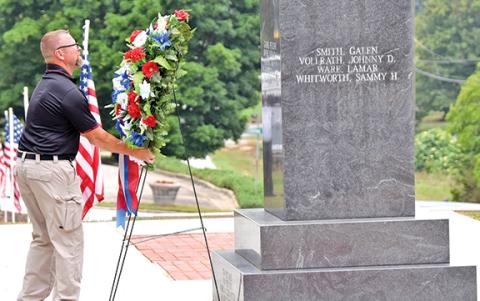 Dusty Morgan lays a wreath at the Franklin County war memorial at the Franklin County Courthouse Monday during Memorial Day ceremonies. (Photos by Scoggins)