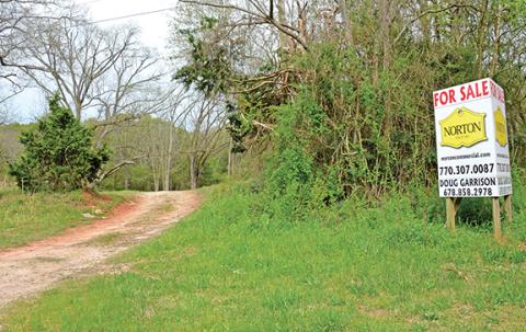 The Franklin County School System closed Monday on property on Highway 145 that will be the home of a new elementary school.