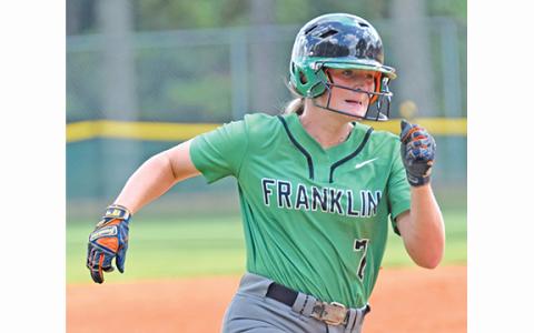 Journey Roberts heads toward the plate during action Saturday against Lanier in a tournament held in Winder. (Photo by Scoggins)