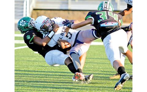 FCMS Cub Sihon Wigfall takes down an Elbert ballcarrier as Myles Kelley comes in to help during a game Thursday in Carnesville. (Photo by Rose Scoggins)