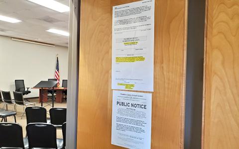 Information about public comment at Franklin County Board of Education meetings is posted on the door of the meeting room in addition to on the board's webpage. (Photo by Sinclair)