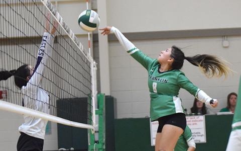 Alejandra Sanchez knocks the ball back over the net in action against Athens Christian Thursday in Carnesville. (Photo by Scoggins)