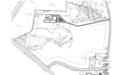 Work on a new SAE barn on High Road has been slowed over whether it will be designated a commercial or agricultural facility.