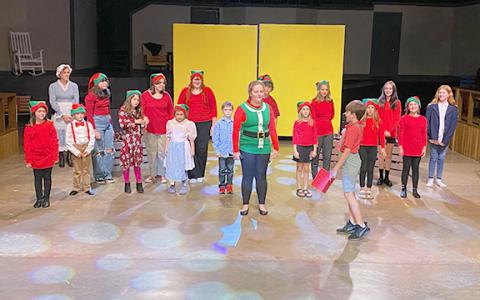 The cast performs a scene from “A Fairy Tale Christmas Carol,” which opens Nov. 18 at the Lavonia Cultural Center.