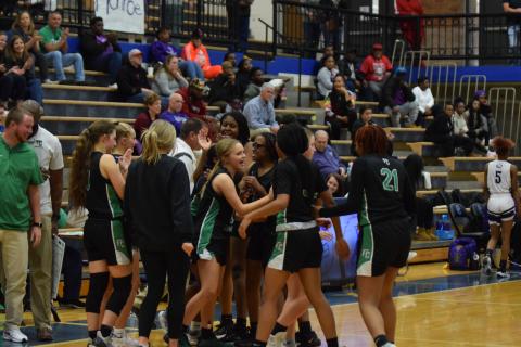 The Franklin County Lady Lions celebrate after defeating Monroe Area Monday in the first round of the Region 8AAA tournament to clinch a state playoff berth. (Photo by Scoggins)