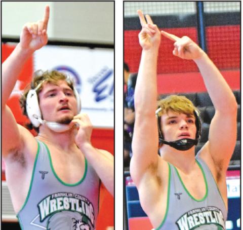 Brady Simms (left) and Jacob Baughcum (right), pictured at the area tournament, each finished as state runners-up in their weight classes Saturday at the State Traditional Wrestling Tournament in Macon.