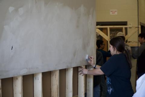 Seniors at Franklin County High School were put through a series of stations last week to learn basic life skills, including home repairs, changing a tire, personal finances and CPR. (Photos by Raese)