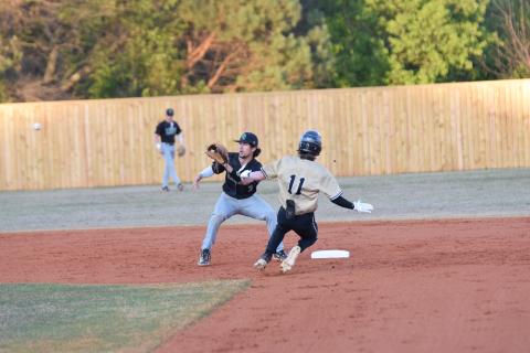 Lion shortstop Dee Oliver prepares to take a throw as a Pendleton, S.C., runner attempts to steal in a game Friday in Carnesville. (Photo by Scoggins)