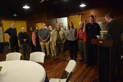 Chief Shane Edmisten takes the oath as Lavonia’s new police chief from Mayor Courtney Umbehant. Edmisten was joined by wife Michelle, his father Duane, other members of his family and former supervisors from the Suwanee Police Department. (Photo by Scoggins)
